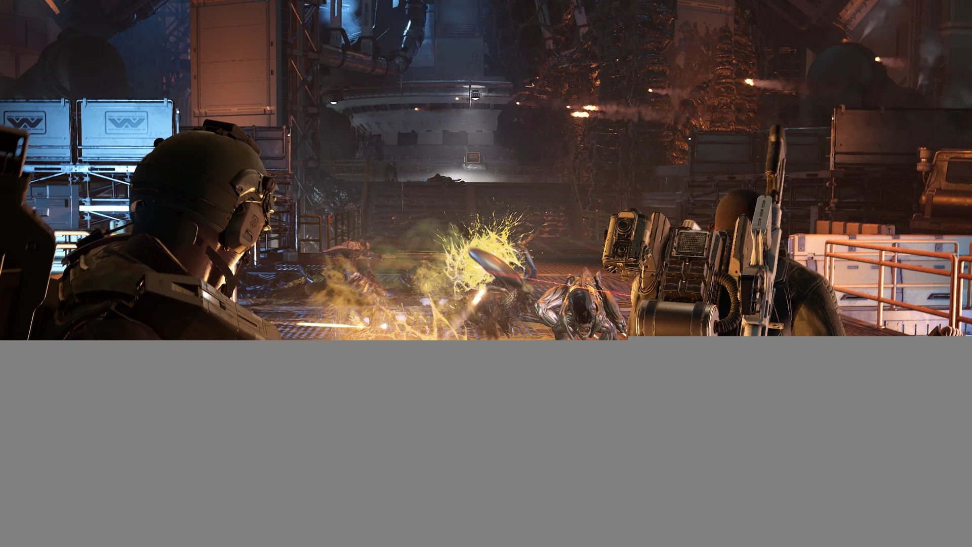A Colonial Marine fireteam fighting Xenomorphs in an official gameplay screenshot